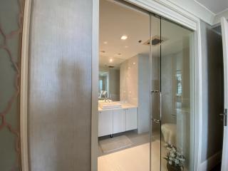 Modern bathroom with glass shower door and vanity