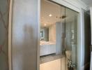 Modern bathroom with glass shower door and vanity