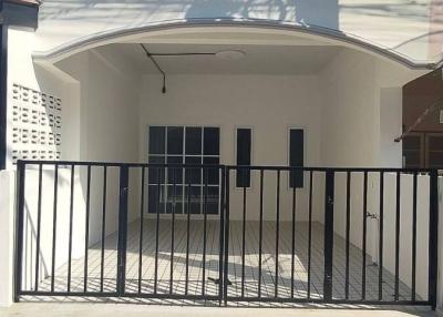 Secure gated entrance of a modern residential building