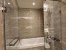 Modern bathroom with bathtub and glass shower