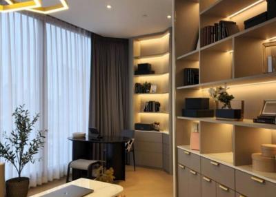 Modern living room with sleek design and bookshelves