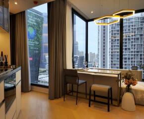 Modern kitchen with large windows and city view