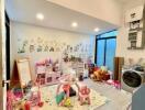 Spacious playroom with toys and modern appliances