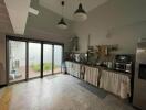 Modern kitchen with sliding doors to outdoor area