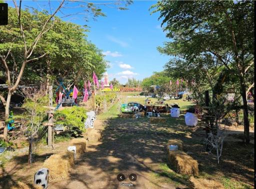 Spacious public park with recreational facilities and greenery