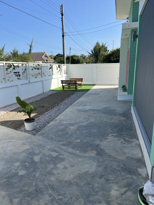 Neat residential outdoor space with sitting area