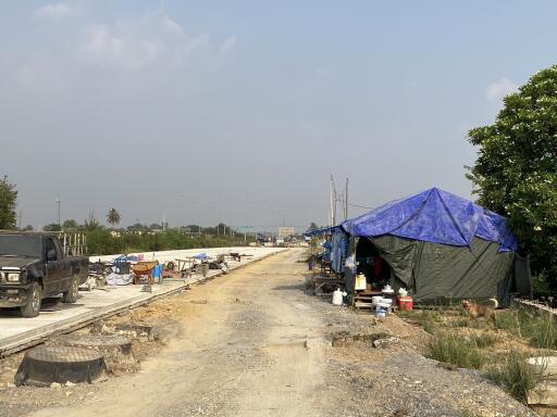 Construction site with temporary shelter and materials