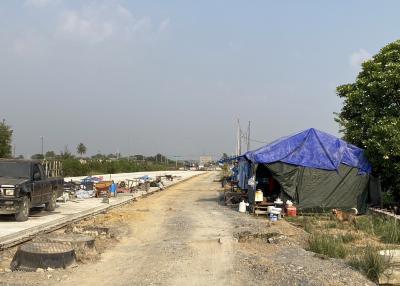 Construction site with temporary shelter and materials