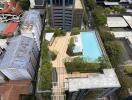 Aerial view of rooftop with swimming pool and lounge area