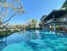 Spacious outdoor swimming pool adjacent to modern home