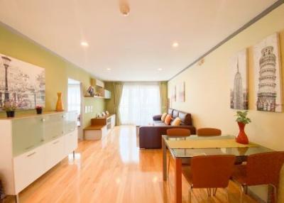 Bright and spacious living room with dining area