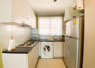 Compact and fully equipped kitchen with modern appliances