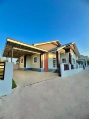 Modern single-story house with attached carport