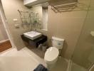 Modern bathroom with glass shower enclosure and sleek vanity