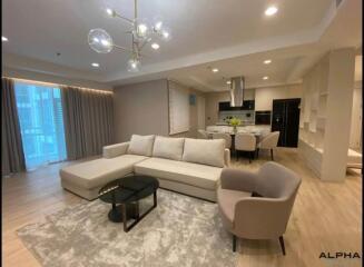 Modern living room with an open concept kitchen