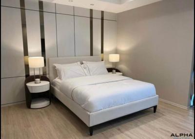 Modern bedroom with elegant design and ambient lighting