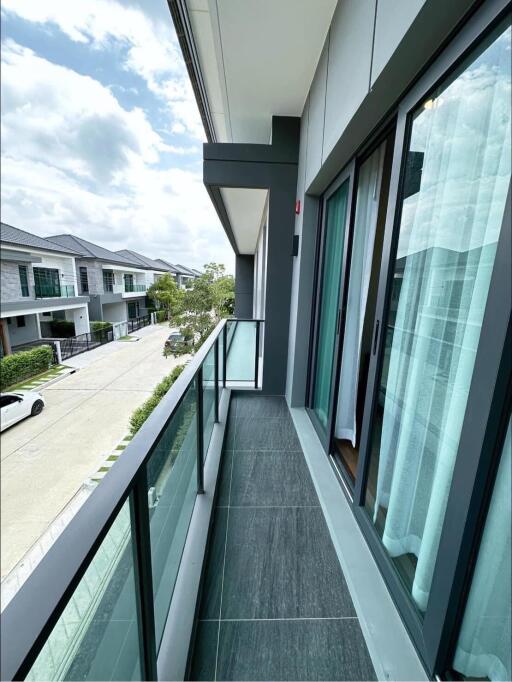 Modern balcony overlooking a residential street