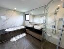 Modern bathroom with double vanity and glass-enclosed shower