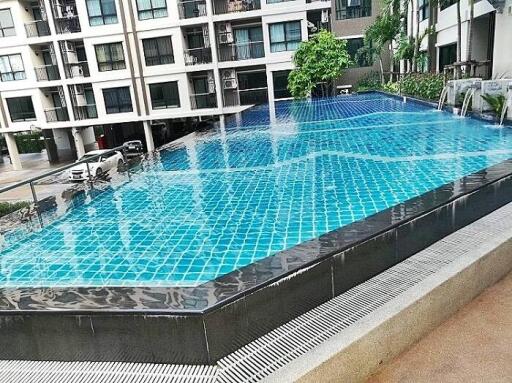 Swimming pool in the amenity area of a modern apartment complex