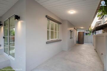 Bright and modern exterior pathway of a residential property at dusk