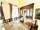 Elegant dining room with large table and natural lighting