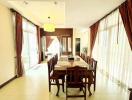 Spacious dining room with large windows and ample natural light