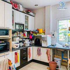 Bright and fully equipped kitchen with ample counter space