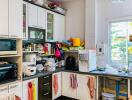 Bright and fully equipped kitchen with ample counter space