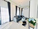 Well-lit modern living room with elegant furnishings