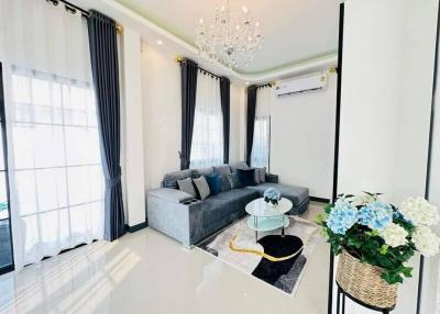 Well-lit modern living room with elegant furnishings