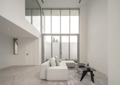 Spacious modern living room with large windows