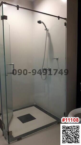 Modern bathroom with glass shower enclosure