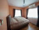 Cozy bedroom with ample natural light