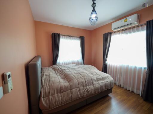 Cozy bedroom with ample natural light