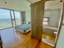 Cozy bedroom with ocean view and natural light