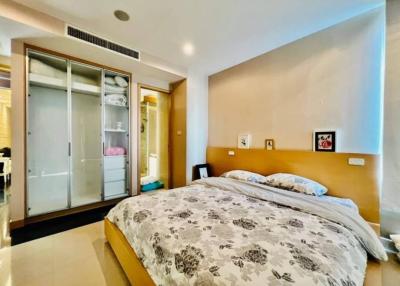 Spacious bedroom with king-sized bed and built-in wardrobe