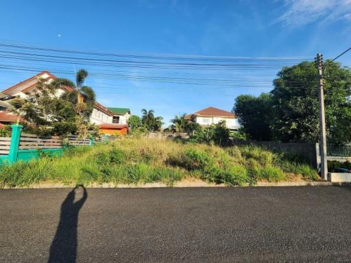 Suburban neighborhood with houses and clear blue sky