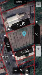 Aerial view of a rectangular land plot with marked dimensions