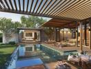 Elegant outdoor living space with pool and lounging area