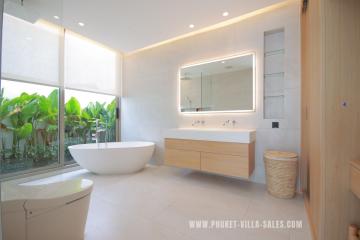 Spacious modern bathroom with natural light