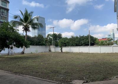 Open land with potential for development near urban buildings