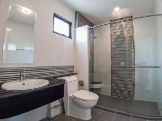 Modern bathroom with glass shower and contemporary fixtures