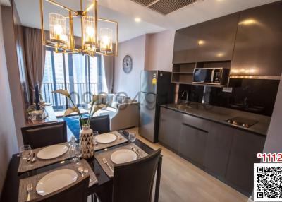 Modern kitchen with integrated dining space showcasing elegance and clean lines