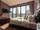 Modern bedroom with large windows and city view