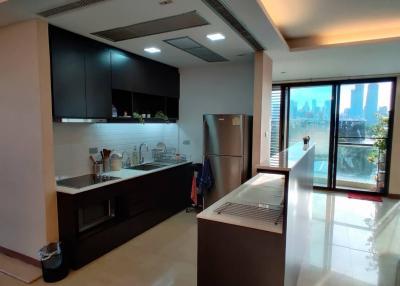 Modern kitchen with city view and open layout