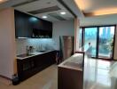 Modern kitchen with city view and open layout