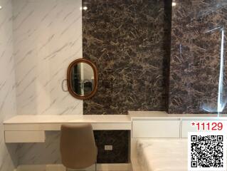 Elegant bathroom with marble walls and a modern vanity