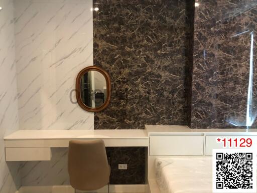 Elegant bathroom with marble walls and a modern vanity