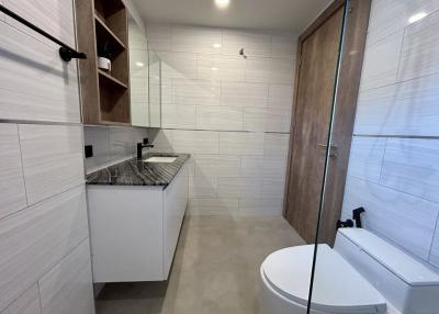 Modern bathroom with walk-in shower and sleek design