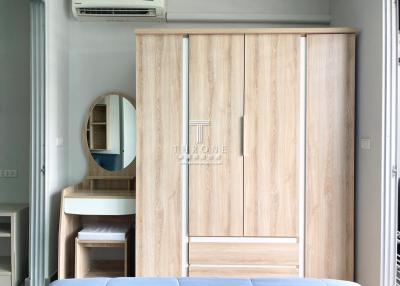 Contemporary bedroom with wardrobe, AC and vanity